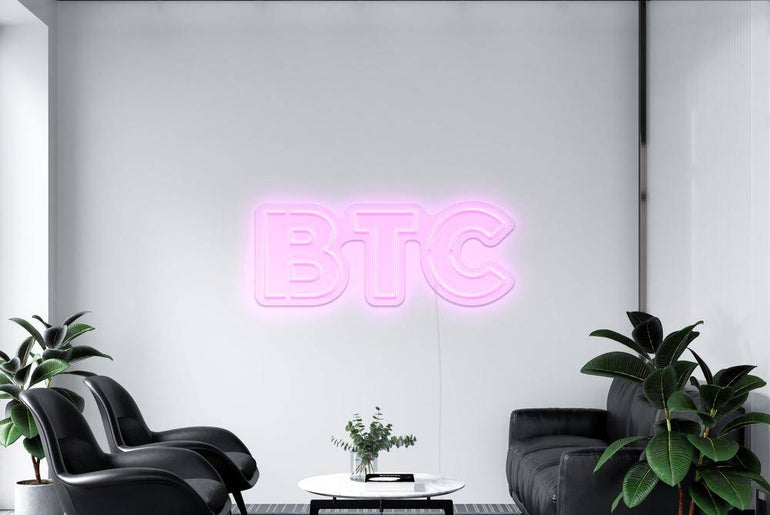 Rosa BTC Neonidas LED-Schild im Raum
