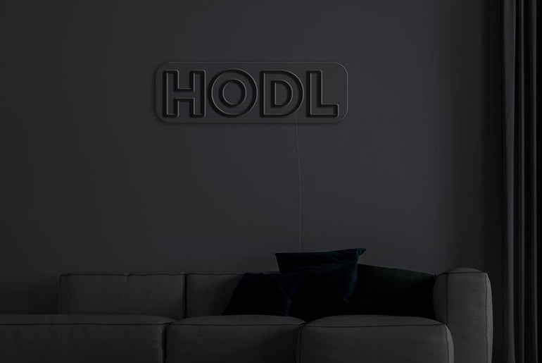 HODL Neonschild ausgeschaltet über Sofa