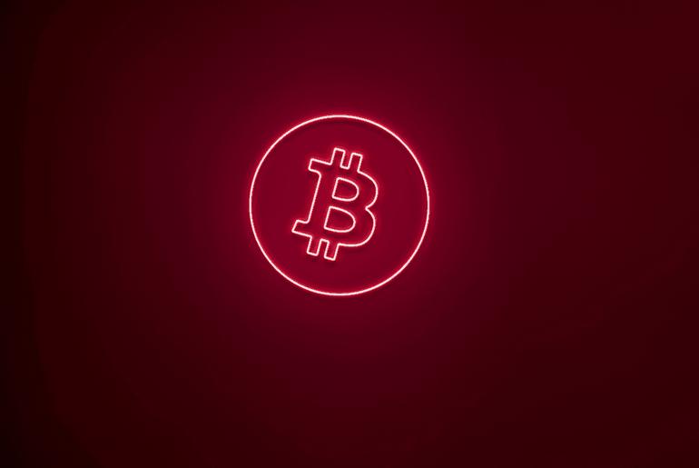 Rotes Bitcoin Logo Neon Schild an der Wand